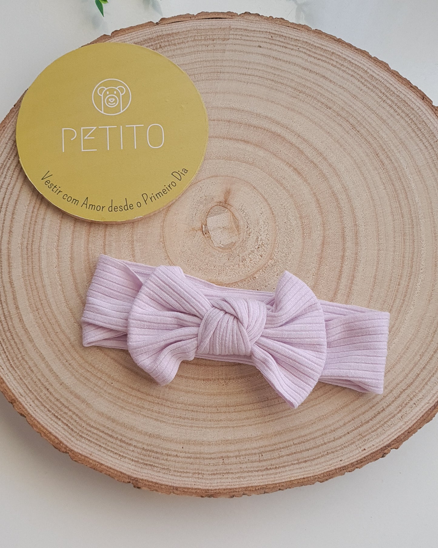 Fita de cabelo com laço