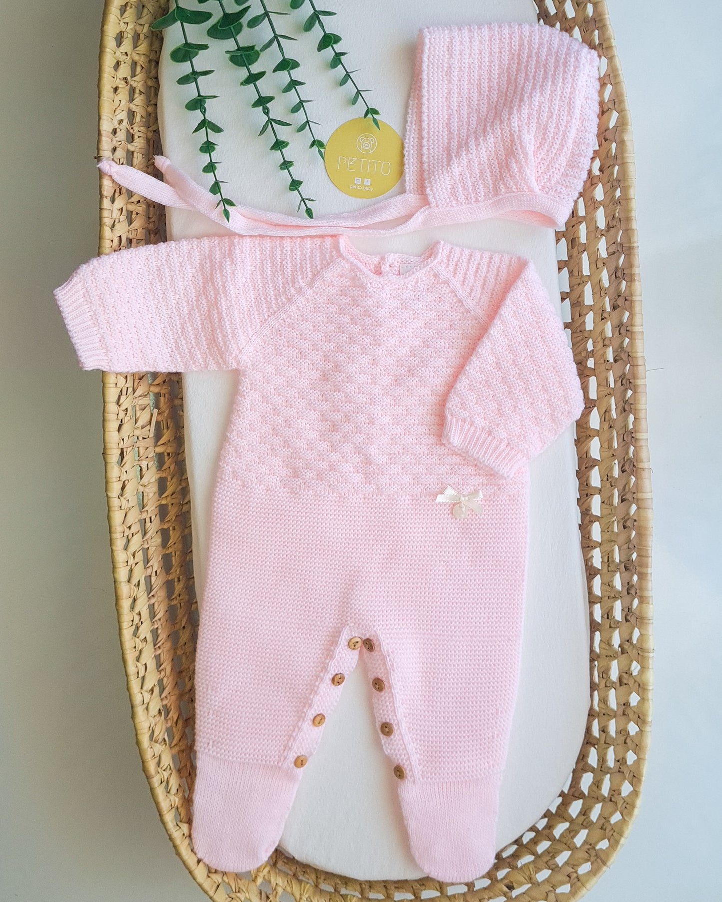 Babygrow de malha com touca