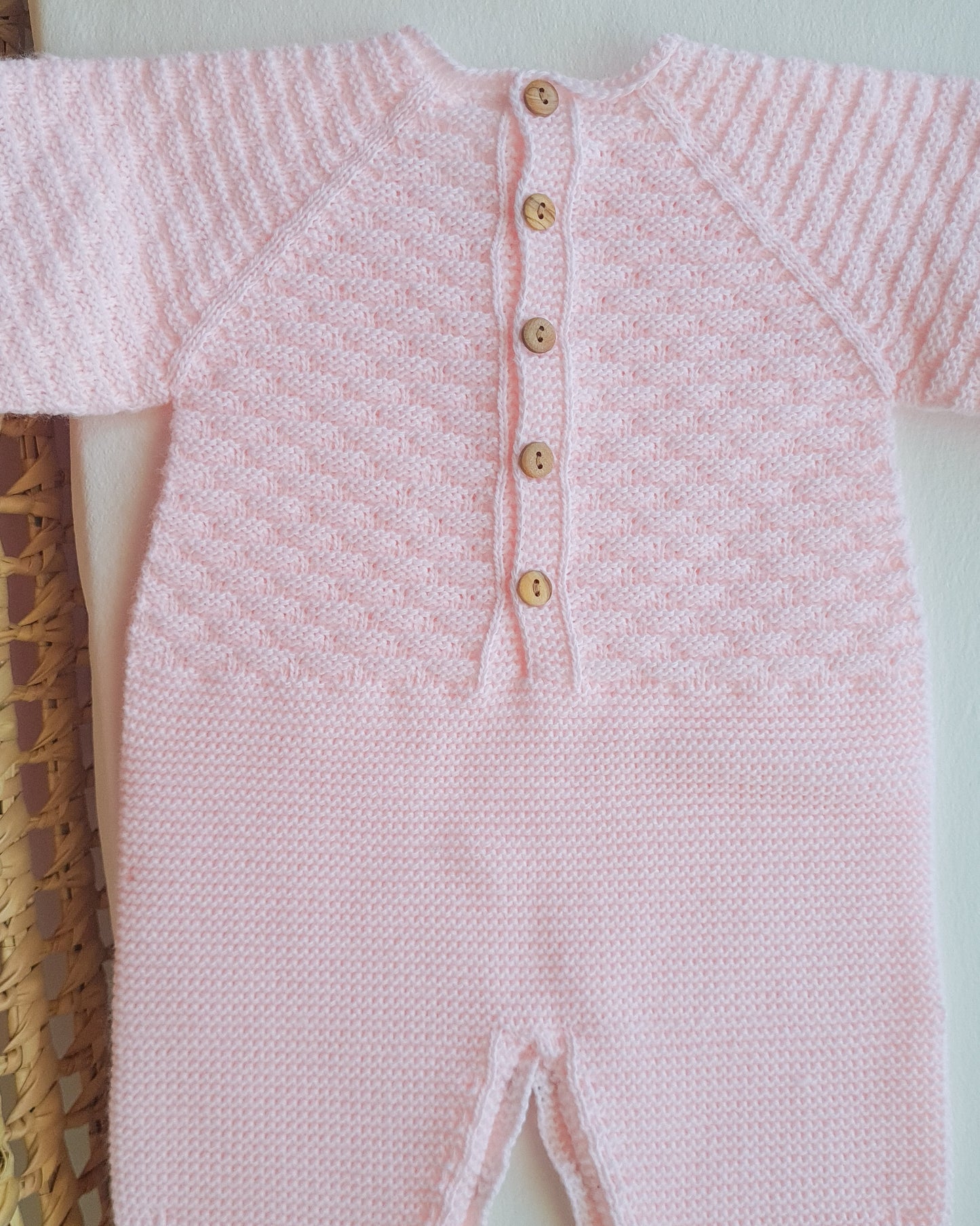 Babygrow de malha com touca