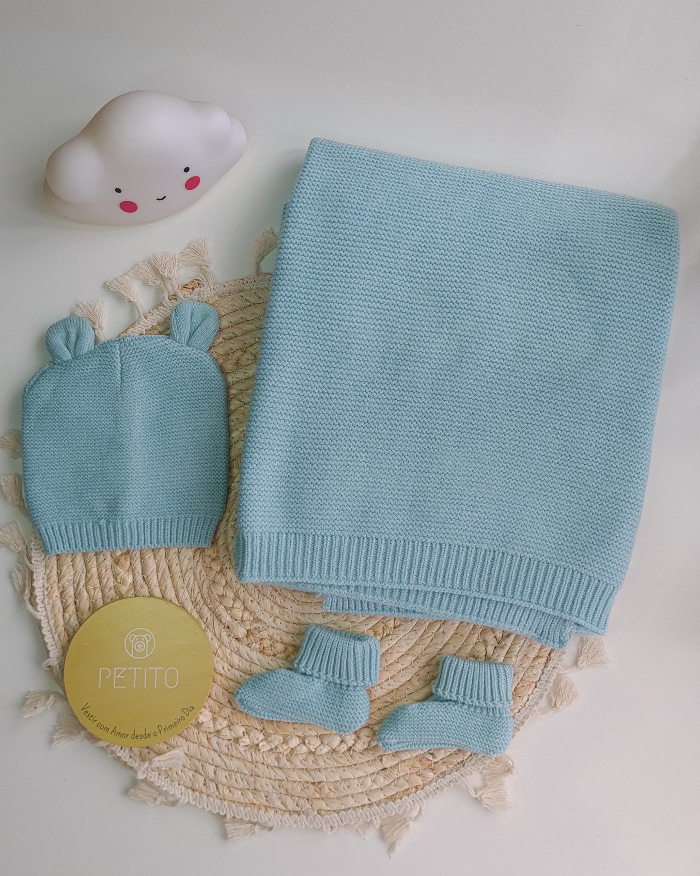 Conjunto manta + gorro + carapins