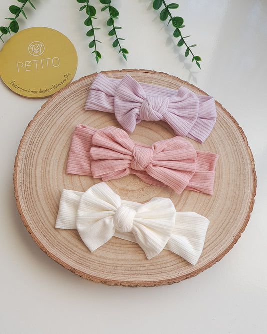 Fita de cabelo com laço
