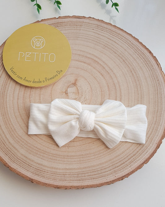 Fita de cabelo com laço