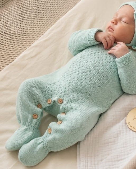 Conjunto babygrow de malha e touca